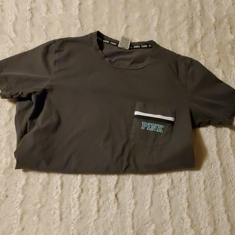 XS PINK tee. Gray/blue in color